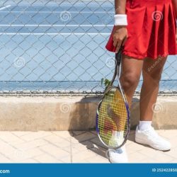 A tennis player standing 12.6 m from the net