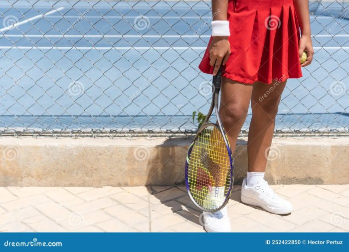 A tennis player standing 12.6 m from the net